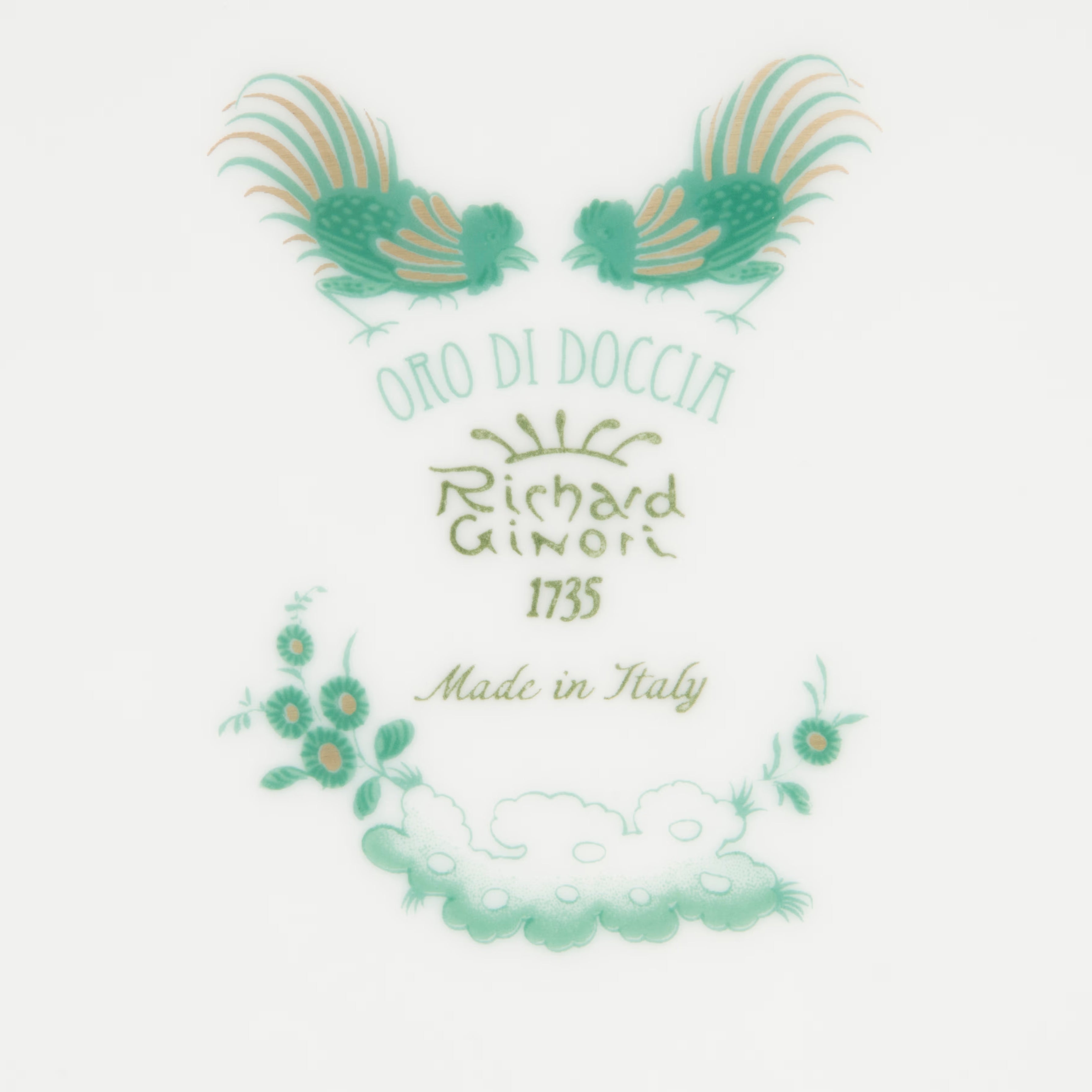 GIADA Decorative logo with rooster illustrations and floral elements on a white background. "Ginori 1735 Is Luxury Tableware Brand And Also Great For Designer Home Gifts"
