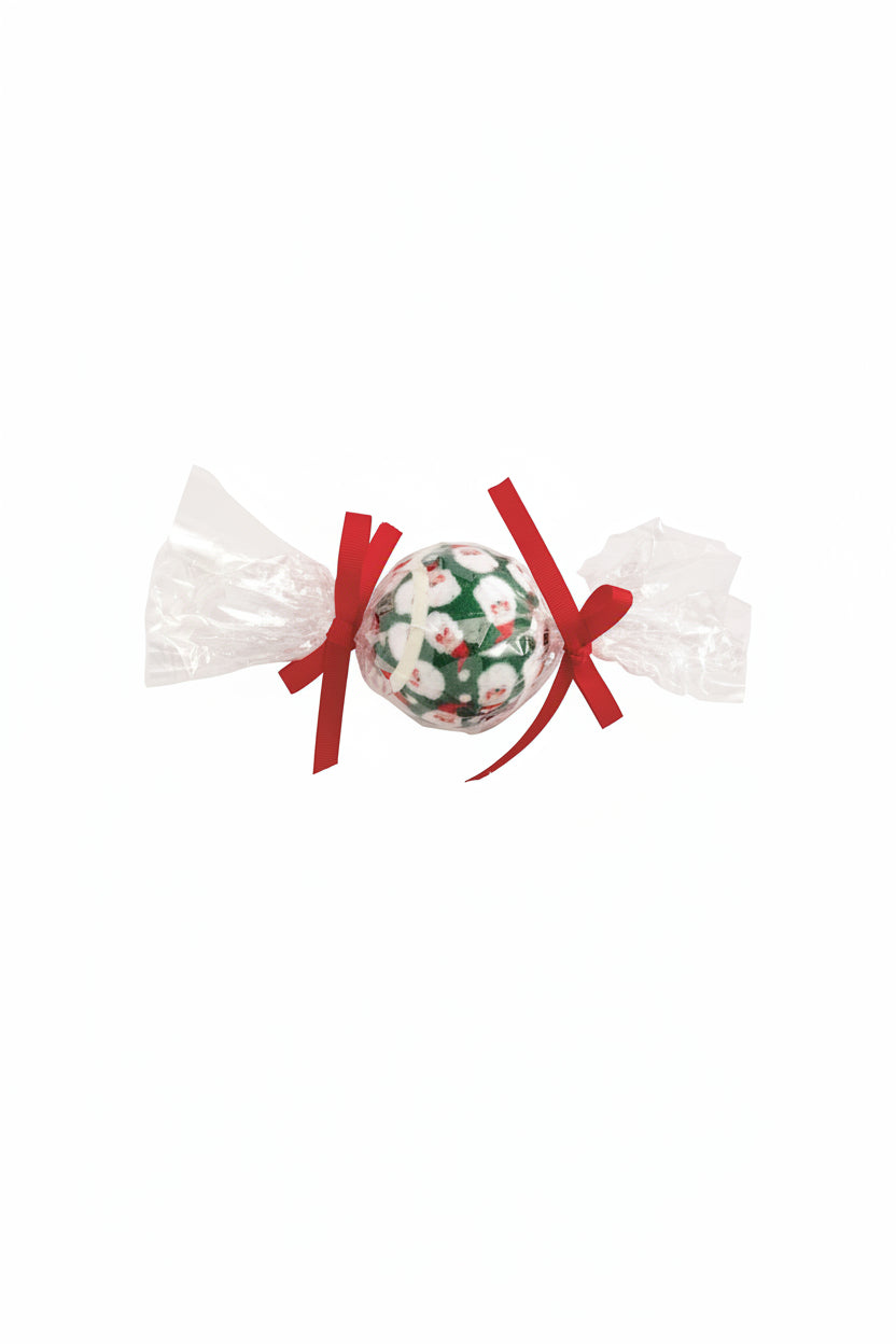 Three Christmas-themed tennis balls in clear wrappers with red, green, and floral designs on a white background.