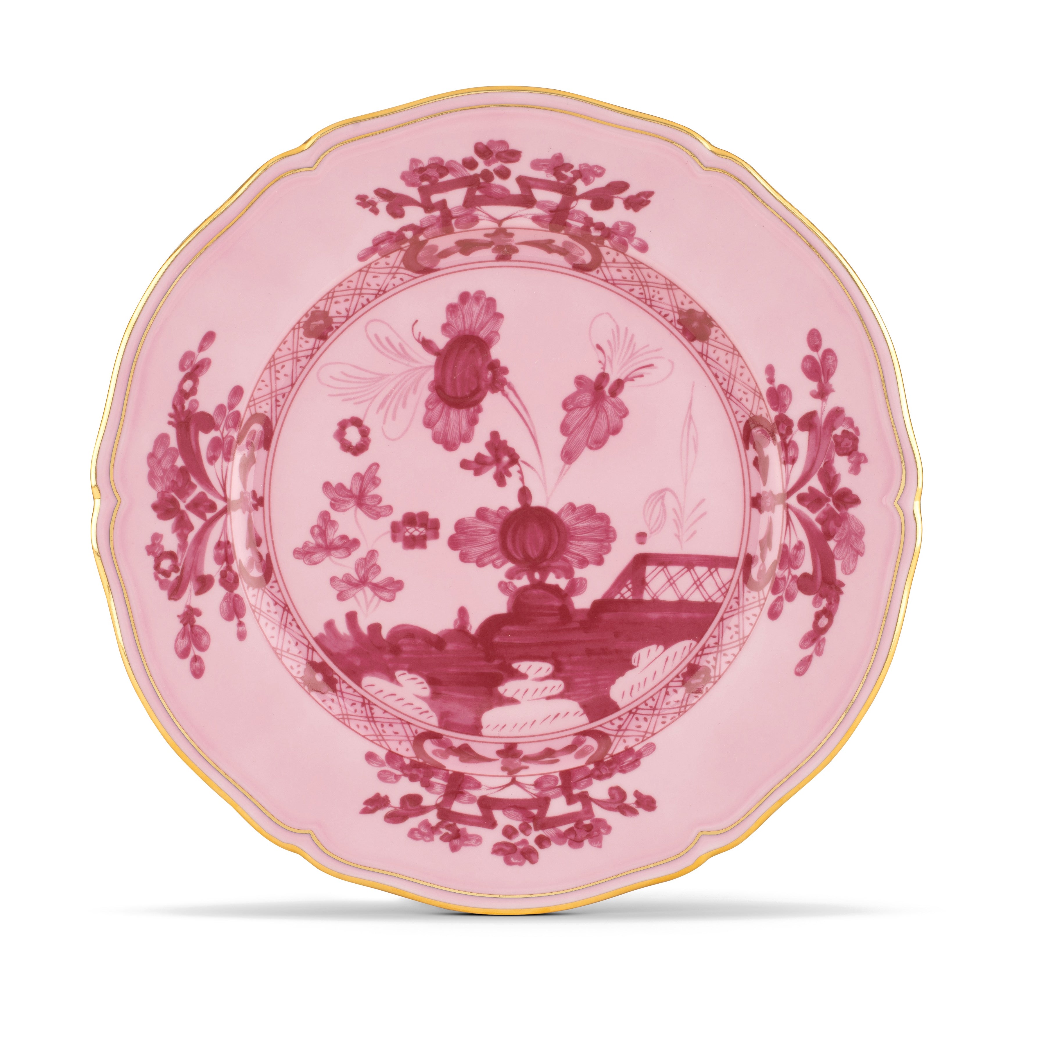 Elevate your dining experience with the exquisite Oriente Italiano Collection Porcelain PORPORA Charger Plate, a masterpiece from Ginori 1735. This luxurious charger plate is meticulously crafted from fine white porcelain, offering a canvas for intricate artistry. The delicate floral ornamentation, hand-painted in pure gold, traces the classic lines of the Antico Doccia pattern, a signature of the esteemed Florentine Maison.