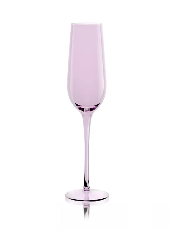 Add a touch of vibrant color and handcrafted elegance to your celebrations with the Qualia Carnival Champagne Flute. Mouth-blown from premium glass, this slender flute features a refined silhouette designed to beautifully showcase champagne, sparkling wine, and celebratory cocktails. Available in an eye-catching palette of purple, green, and pink, each flute brings a playful yet sophisticated accent to any tablescape.