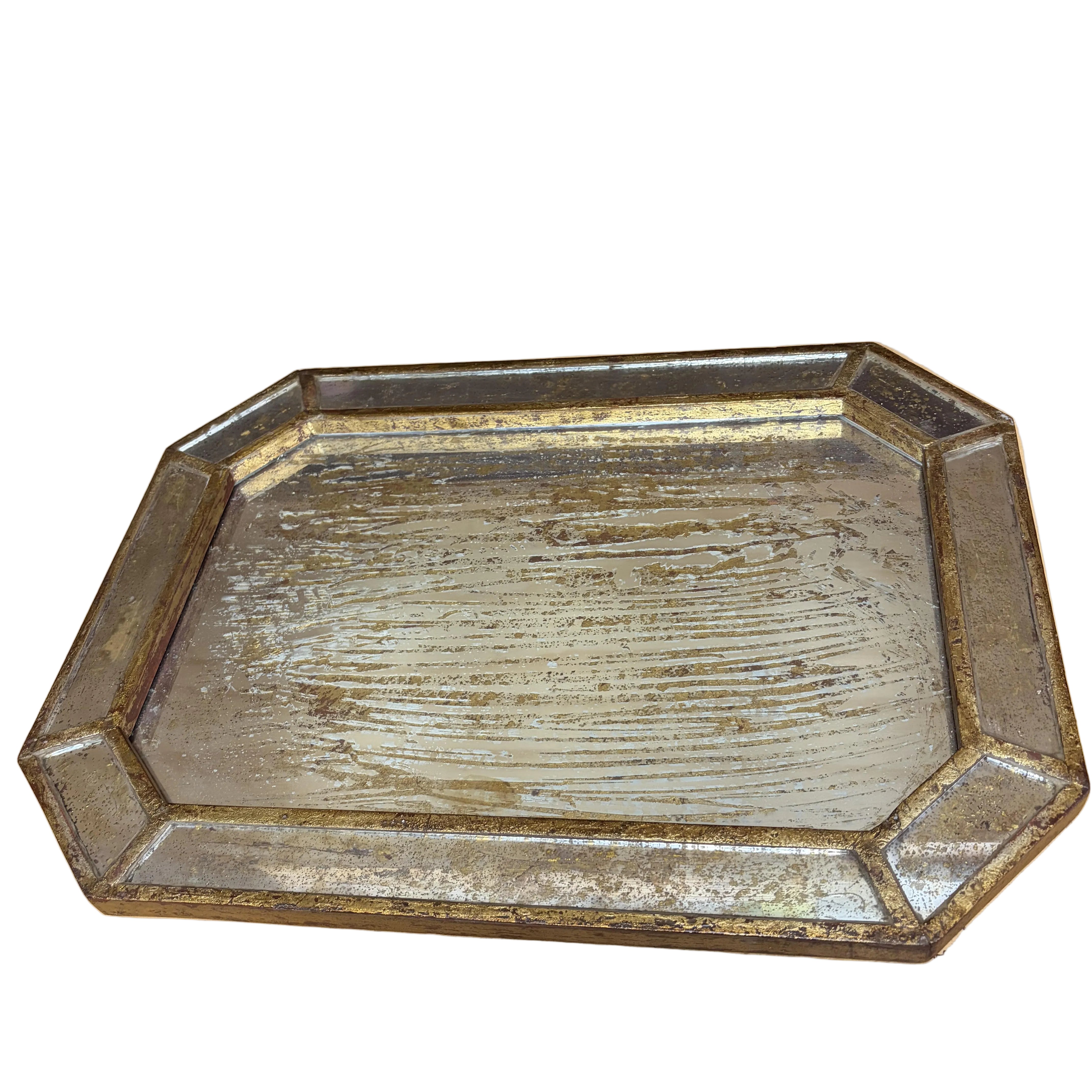 Glass tray on a wooden surface with a dark background