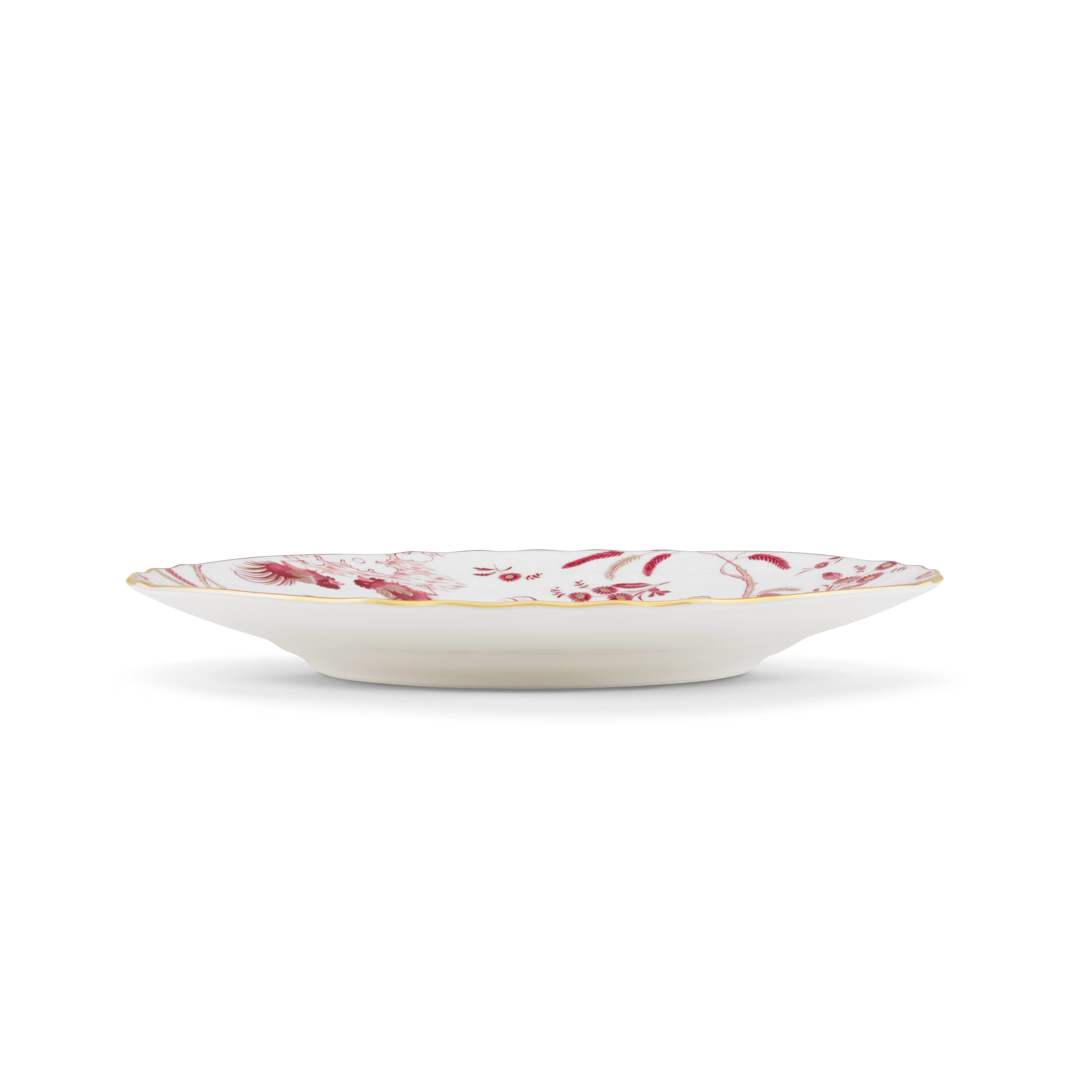 Decorative Pickle Dessert Plate with floral Megenta Ji Ondori rooster pattern on a white background. "Ginori 1735 Is Luxury Tableware And A Great Designer Home Gifts"
Oro Di Doccia A white porcelain dessert plate with intricate floral patterns and gold accents. A Ji Ondori Rooster.