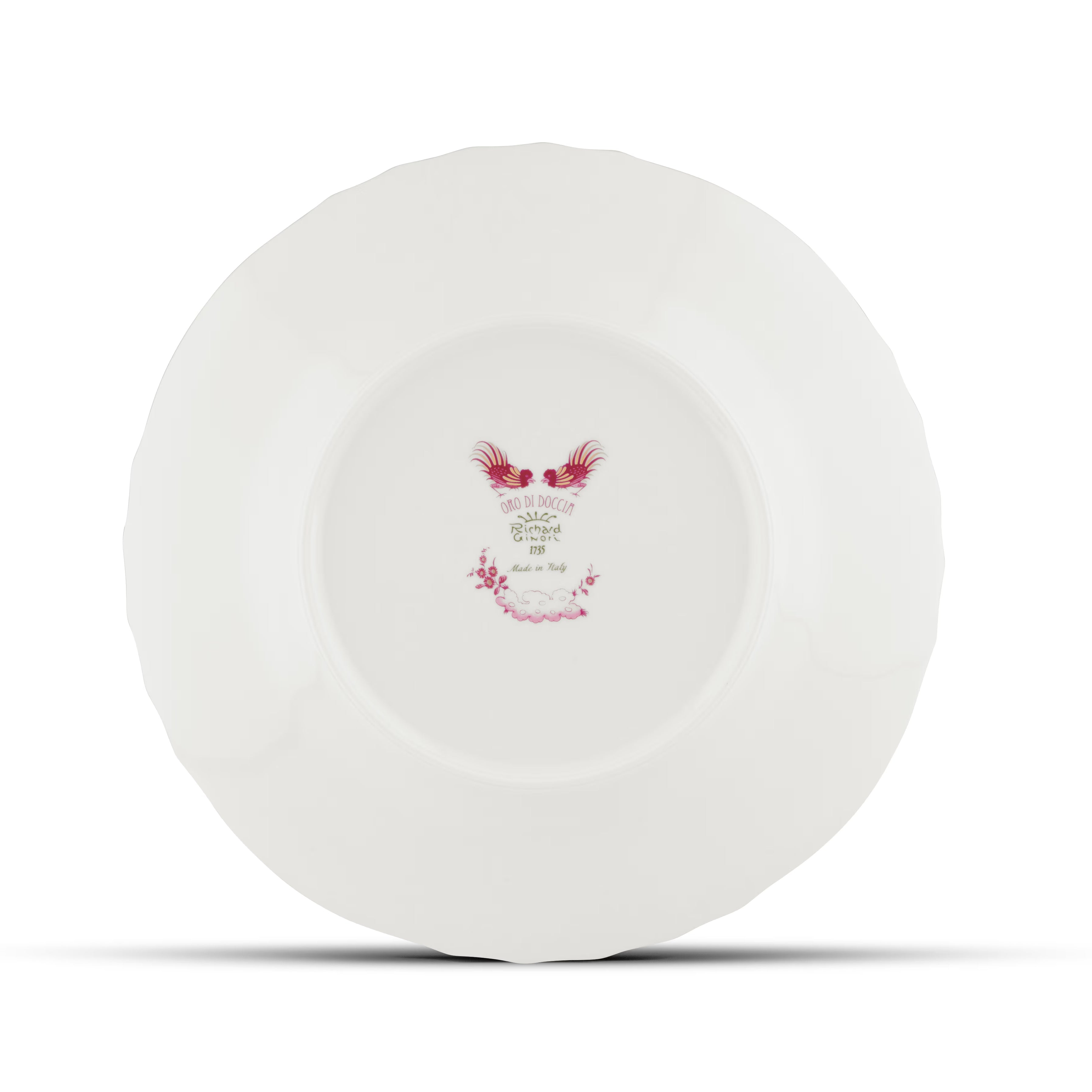 Decorative Dessert Plate with floral Megenta Ji Ondori rooster pattern on a white background. "Ginori 1735 Is Luxury Tableware And A Great Designer Home Gifts"
Oro Di Doccia A white porcelain dessert plate with intricate floral patterns and gold accents. A Ji Ondori Rooster.