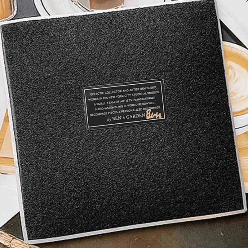 In the French tradition of decoupage, these bent-glass trays are handcrafted in our New York Studio. They feature vintage typeset on a natural cream background, and each is individually signed by Ben. Both practical and charming, Ben's signature decoupage is all food safe, wipe clean and the back side is felted.