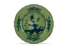 Elevate your dining experience with the exquisite Oriente Italiano Collection Porcelain MALACHITE Charger Plate, a masterpiece from Ginori 1735. This luxurious charger plate is meticulously crafted from fine white porcelain, offering a canvas for intricate artistry. The delicate floral ornamentation, hand-painted in pure gold, traces the classic lines of the Antico Doccia pattern, a signature of the esteemed Florentine Maison.