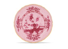 Elevate your dining experience with the exquisite Oriente Italiano Collection Porcelain  PORPORA Charger Plate, a masterpiece from Ginori 1735. This luxurious charger plate is meticulously crafted from fine white porcelain, offering a canvas for intricate artistry. The delicate floral ornamentation, hand-painted in pure gold, traces the classic lines of the Antico Doccia pattern, a signature of the esteemed Florentine Maison.