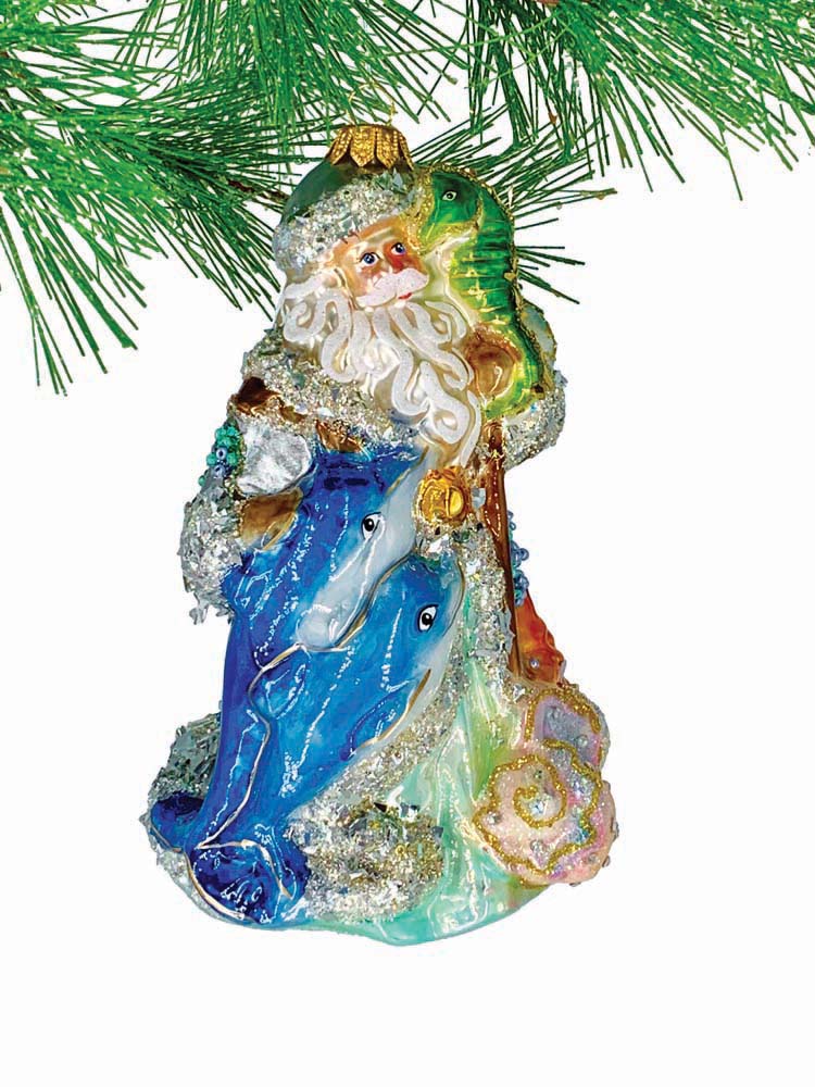 Embrace the whimsy of the season with this Santa ornament featuring playful blue dolphins and a charming green seahorse. 