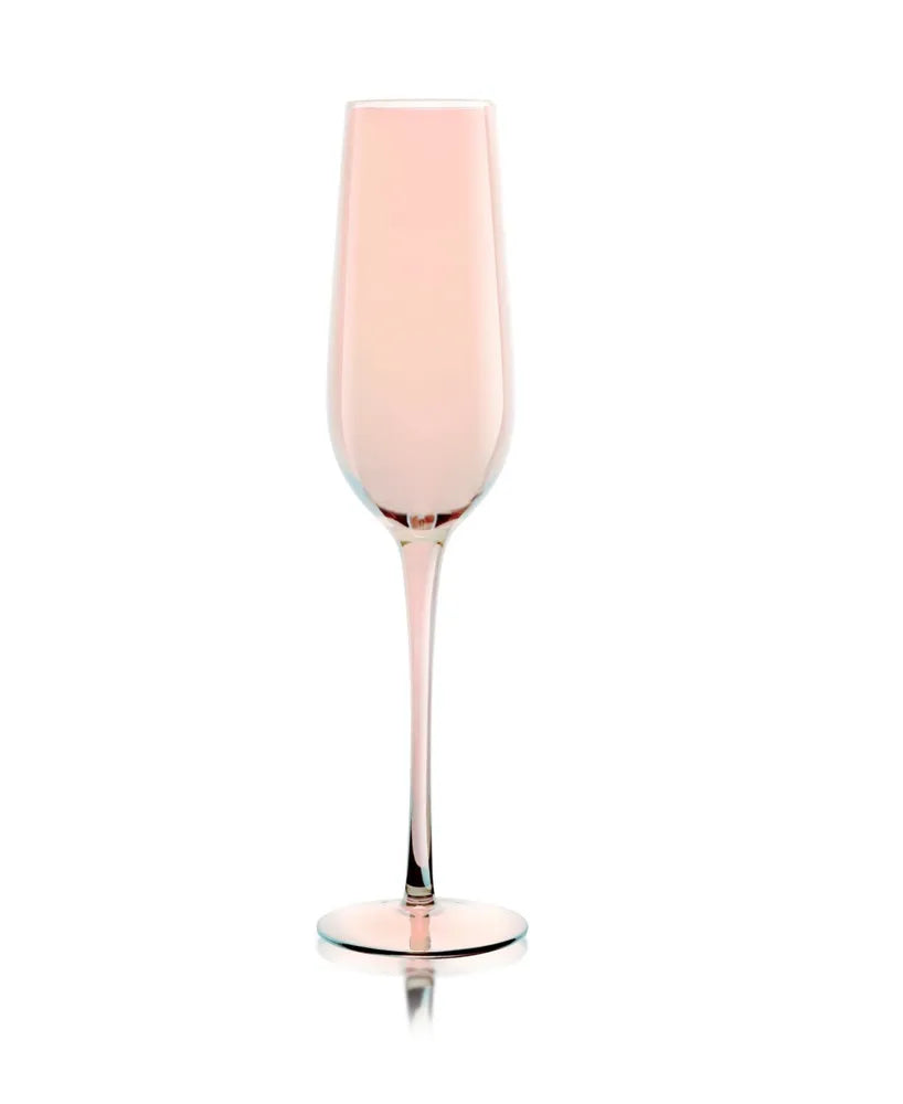 Add a touch of vibrant color and handcrafted elegance to your celebrations with the Qualia Carnival Champagne Flute. Mouth-blown from premium glass, this slender flute features a refined silhouette designed to beautifully showcase champagne, sparkling wine, and celebratory cocktails. Available in an eye-catching palette of purple, green, and pink, each flute brings a playful yet sophisticated accent to any tablescape.