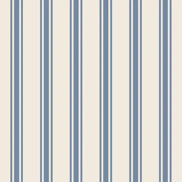 “Refined blue vertical stripes grace a warm beige backdrop, creating a timeless, tailored pattern that brings understated luxury and sophisticated charm to any setting