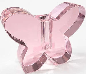 Pink butterfly-shaped object on a white background