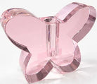 Pink butterfly-shaped object on a white background