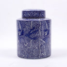 The Large Koi Fish Ginger Jar is crafted with a rich cerulean blue hue
