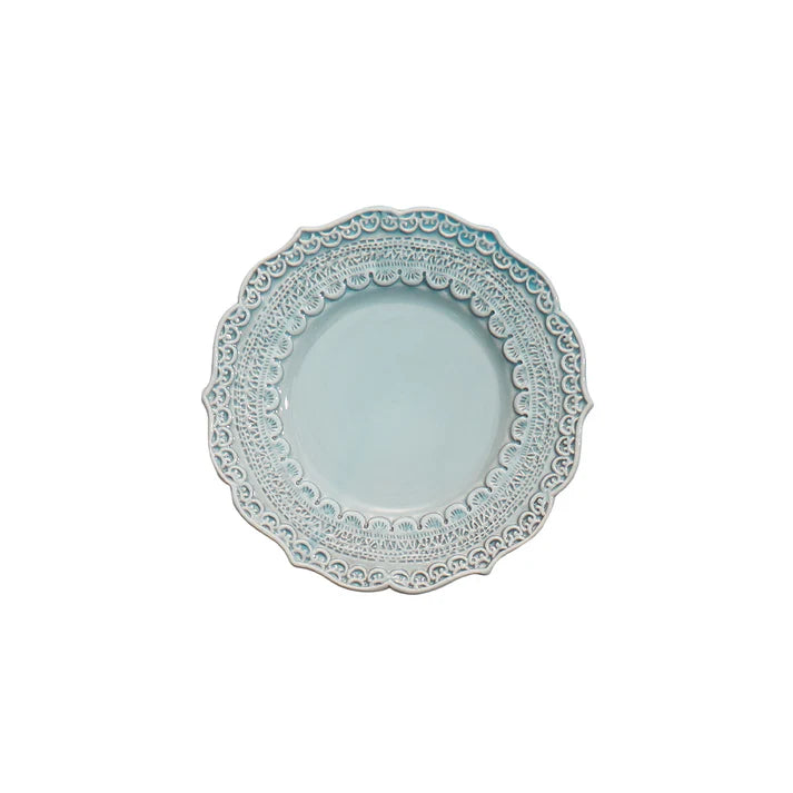 Introduced over a decade ago, Finezza (meaning "refined") is one of our best selling collections year after year. Beloved for its intricate lace design, it is beautiful, durable and easy care. The pieces are also a favorite of exclusive event planners. While most Finezza pieces are in Cream, four pieces (Charger, Dinner, Salad/Dessert and Bread/Canape plates) also come in Blue. The two colors pair beautifully with one another. 
