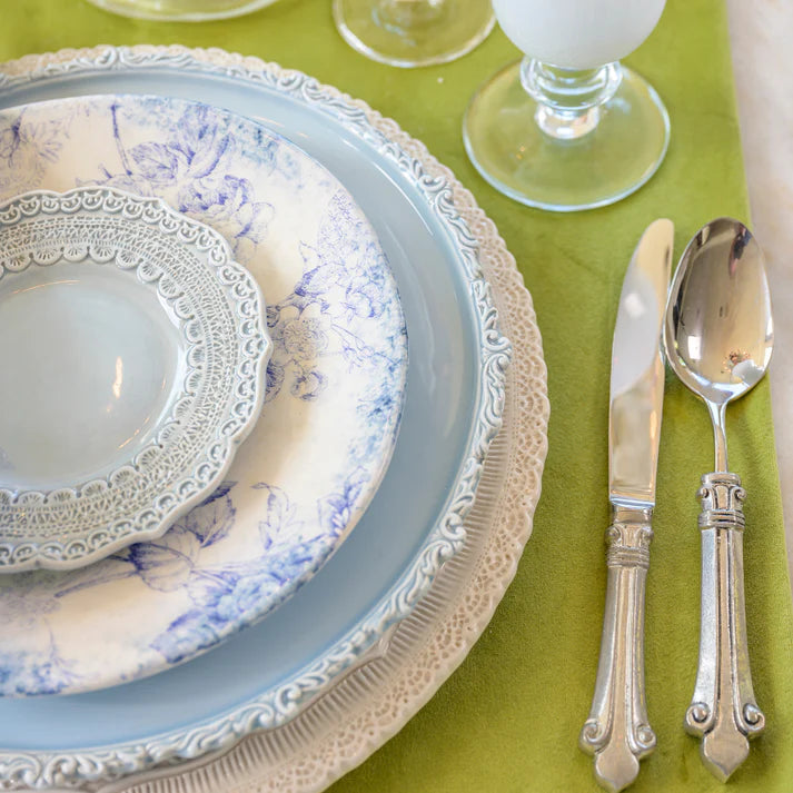  Introduced over a decade ago, Finezza (meaning "refined") is one of our best selling collections year after year. Beloved for its intricate lace design, it is beautiful, durable and easy care. The pieces are also a favorite of exclusive event planners. While most Finezza pieces are in Cream, four pieces (Charger, Dinner, Salad/Dessert and Bread/Canape plates) also come in Blue. The two colors pair beautifully with one another. 