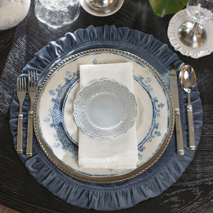 Introduced over a decade ago, Finezza (meaning "refined") is one of our best selling collections year after year. Beloved for its intricate lace design, it is beautiful, durable and easy care. The pieces are also a favorite of exclusive event planners. While most Finezza pieces are in Cream, four pieces (Charger, Dinner, Salad/Dessert and Bread/Canape plates) also come in Blue. The two colors pair beautifully with one another. 