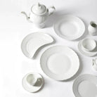 White porcelain bread plate. Vecchio Ginori collection.
Classic and traditional design and craftsmanship, the plate is made of the finest white porcelain worked with an embossed pattern. They are designed for refined table, dominated by the shine and whiteness of the white that highlights each course for an authentic gourmet journey. Vecchio Ginori is an expression of savoir faire and Italian craftsmanship and, with its classic versatility.
