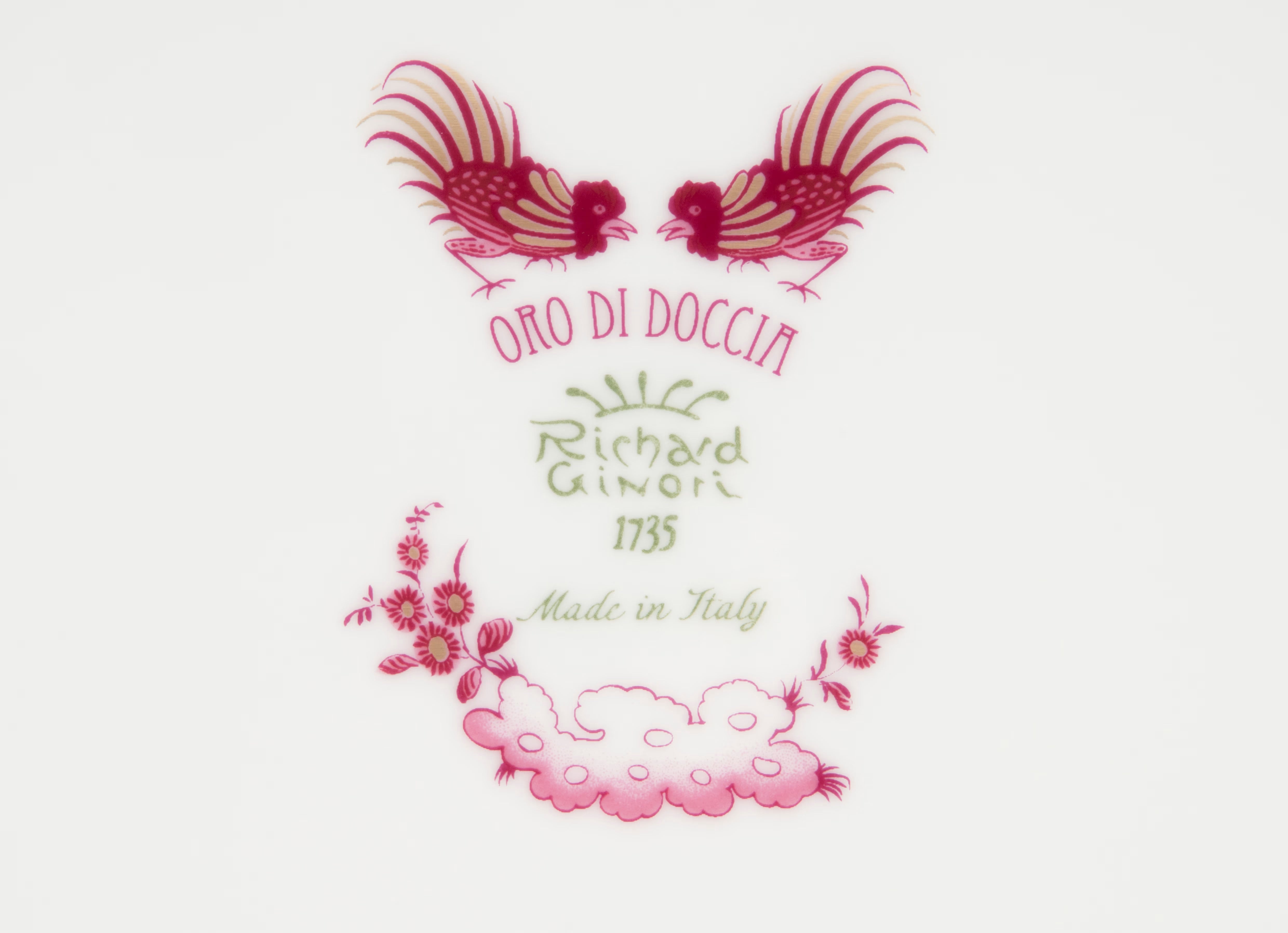 This design is the "Oro Di Doccia" motif in the Magenta colorway, created by the luxury Italian porcelain house Ginori 1735. Luxury Vase With Pink Floral And Bird Pattern.
