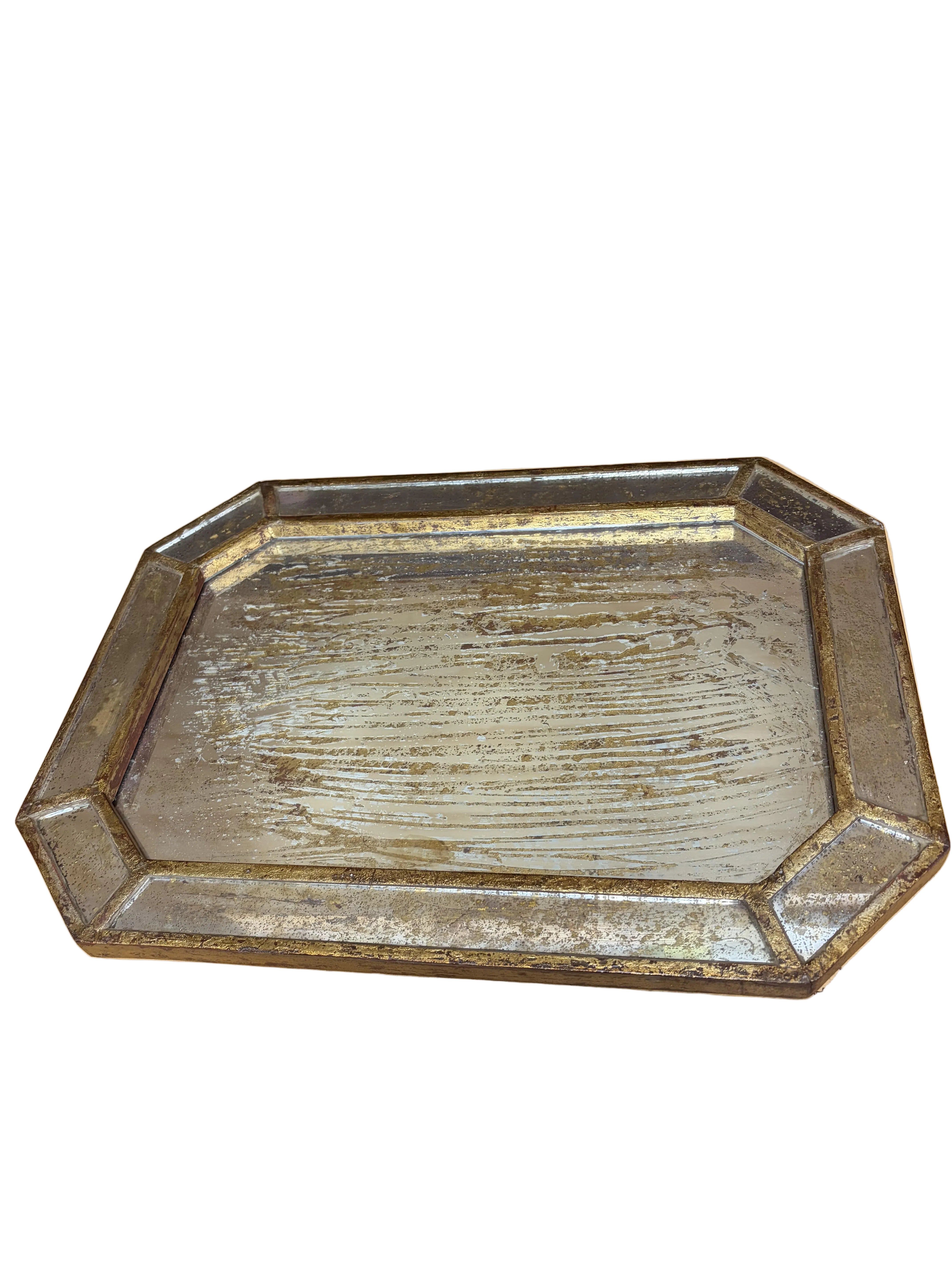 Glass tray on a wooden surface with a dark background