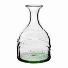 The William Yeoward Vanessa Carafe in Forest Green captures the effortless beauty of the Mediterranean with its rich, jewel-toned hue and handcrafted artistry. Expertly mouth-blown from fine crystal glass, each carafe is individually made by skilled artisans, ensuring that no two pieces are exactly alike. Its graceful silhouette and luminous Forest Green finish make it as striking on display as it is functional for serving water, wine, cocktails, or fresh juices.