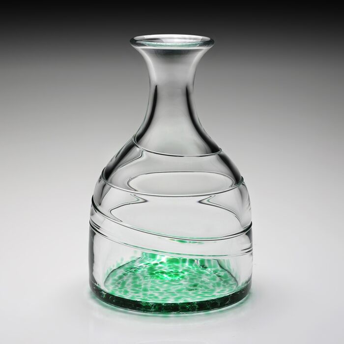 The William Yeoward Vanessa Carafe in Forest Green captures the effortless beauty of the Mediterranean with its rich, jewel-toned hue and handcrafted artistry. Expertly mouth-blown from fine crystal glass, each carafe is individually made by skilled artisans, ensuring that no two pieces are exactly alike. Its graceful silhouette and luminous Forest Green finish make it as striking on display as it is functional for serving water, wine, cocktails, or fresh juices.